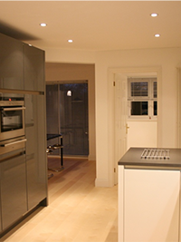 Finished kitchen with more open plan space